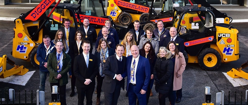 Greenshields JCB Customer Diggerland recieving their machines at JCB World Headquarters