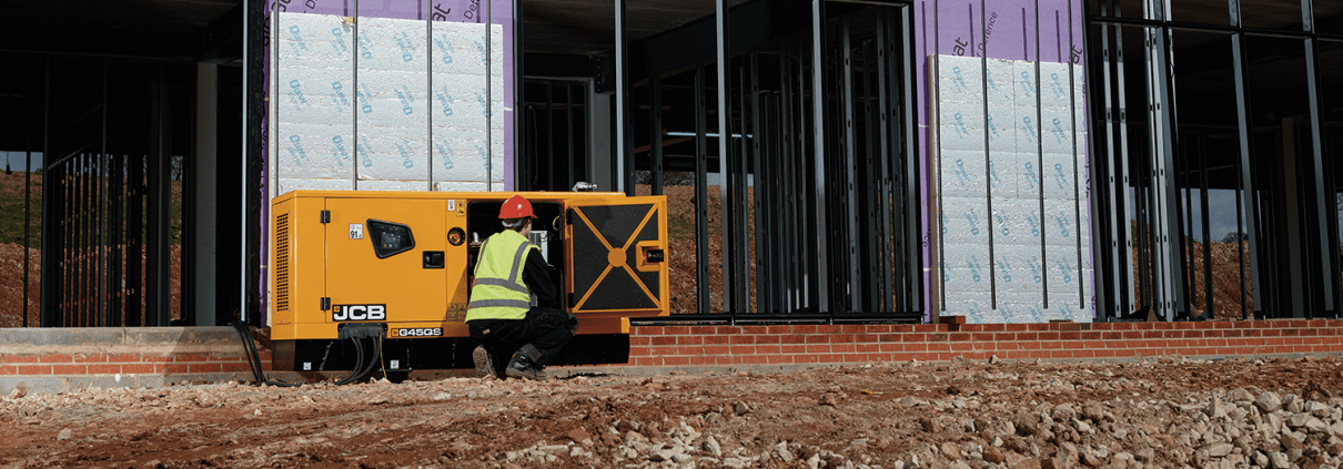 Engineer servicing a JCB G45QS