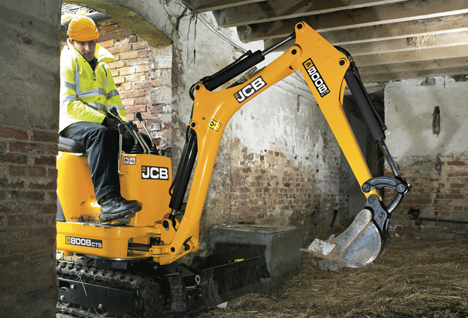 ME-8008-Through-Door 8008 Micro Excavator being driving through a underground door frame