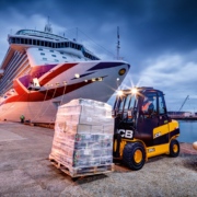 JCB TLT35D moving a pallet by a cruise ship