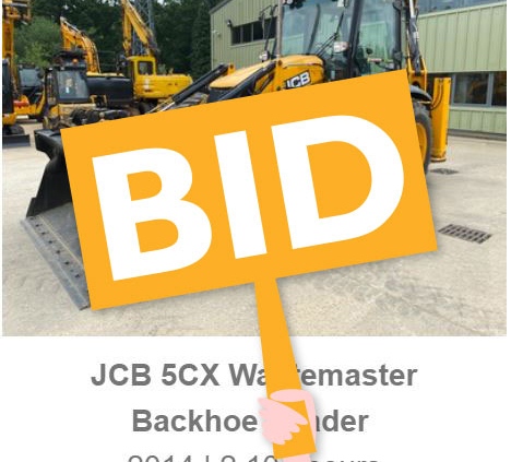 a backhoe with a bid paddle over the top of it