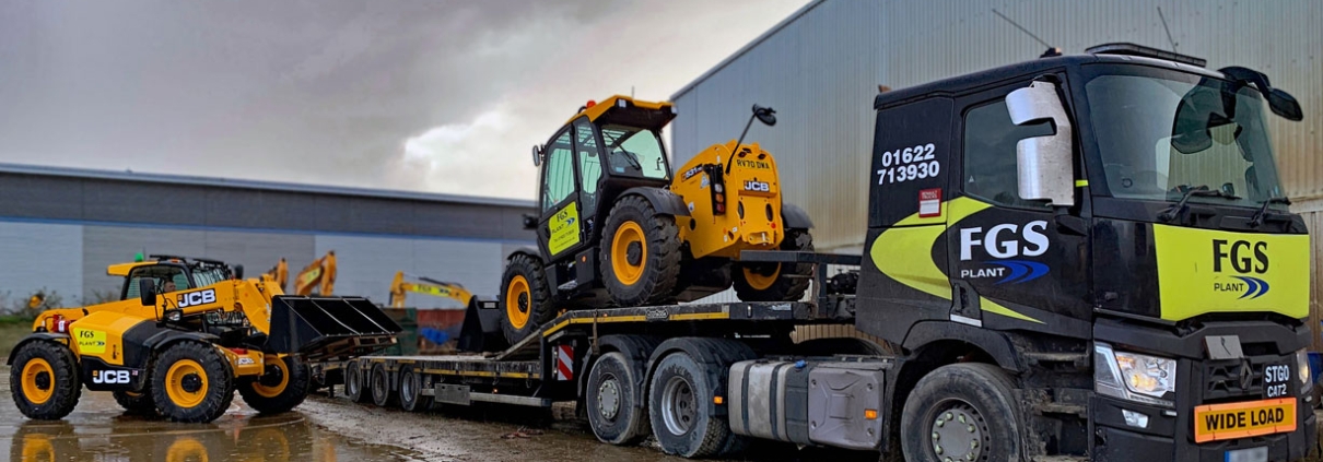 JCB Telehandler signwritten for FGS on the back of a lorry