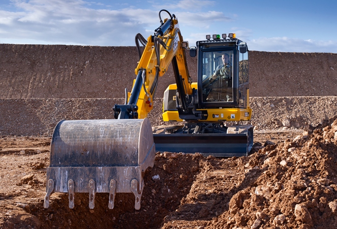 100C-2 Mini Excavator excavating