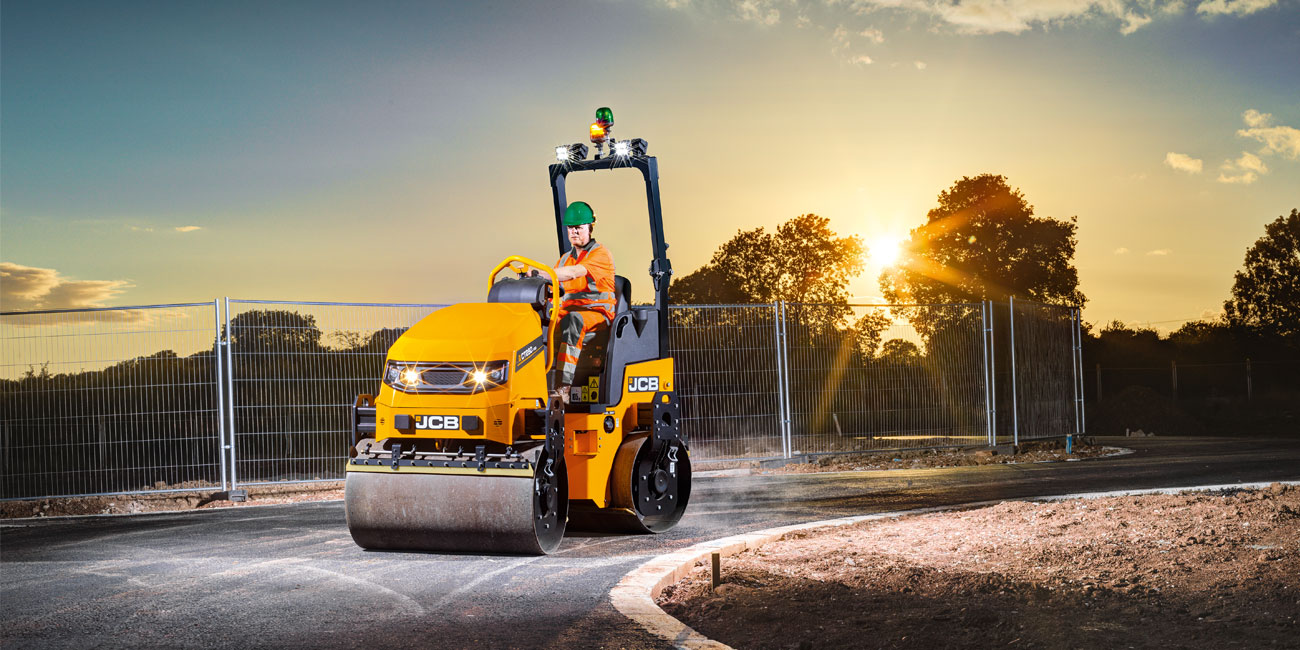A JCB Roller rolling fresh tarmac