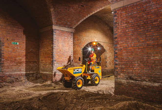 JCB 1T-E Dumper inside a building with a full skip