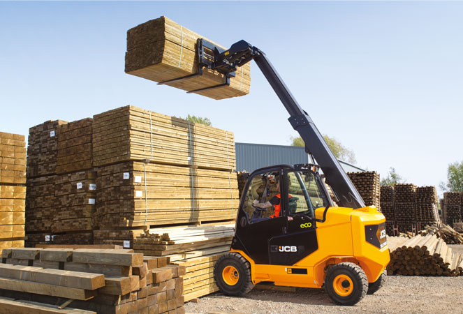 JCB TLT27G Industrial Forklift lifing a stack of wood