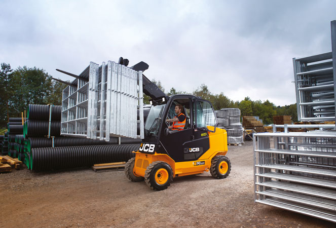 JCB TLT30G Industrial Forklift carrying metal fencing