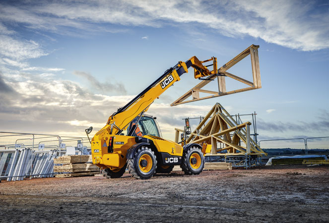 JCB 540v140 Telehandler lifting a house frame