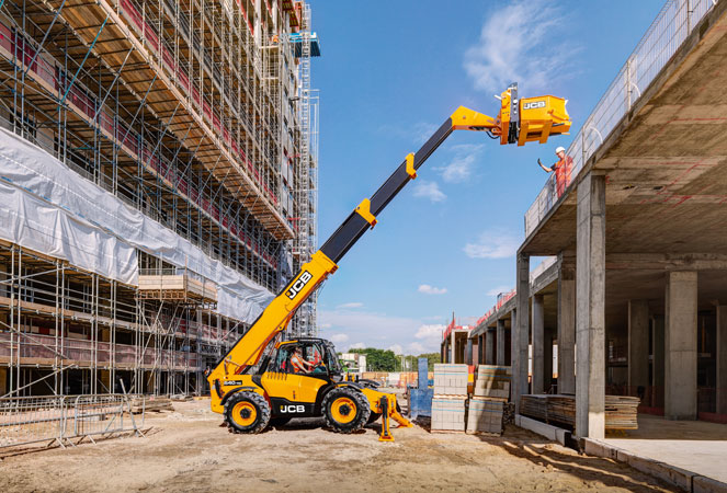 JCB 540v180 Telehandler lifting a skip