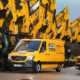 A Greenshields engineer van infront of a row of JCB Tracked Excavators