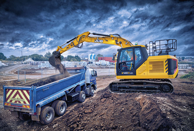 JCB 140X Tracked Excavator unloading a bucket into a lorry