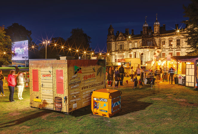 JCB 1.25Qe Power Pack powering a food stand at an event