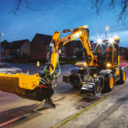 JCB Hydradig 110W Pothole Pro Wheeled Excavator repairing a road