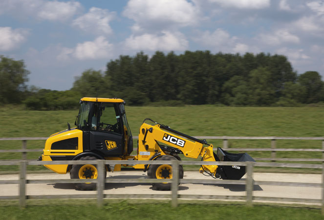 JCB TM320 driving along road